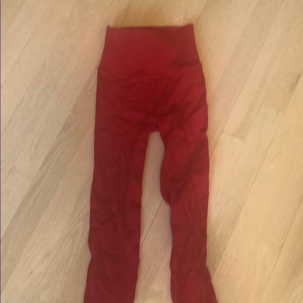 Red fabletics leggings with mesh detail